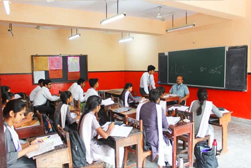Students in a classroom at Ashit Educational Academy